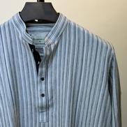 Light grey with multi-tone vertical stripes