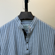 Light grey with multi-tone vertical stripes