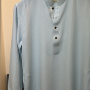 Soft pastel sky blue with subtle tonal self-stripes