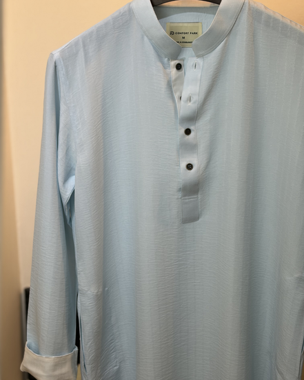Soft pastel sky blue with subtle tonal self-stripes