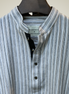Light grey with multi-tone vertical stripes
