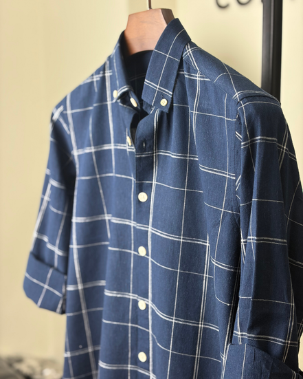 Navy with white grid check shirt