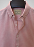 Soft pink shirt with white pinstripes