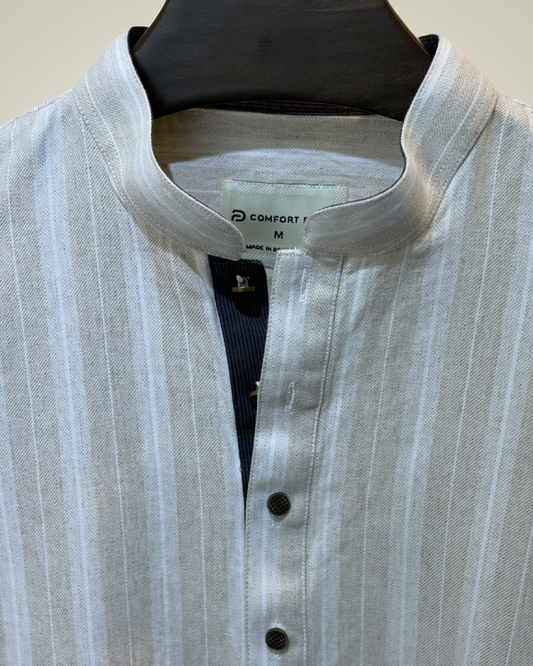 Cream with subtle white pinstripes