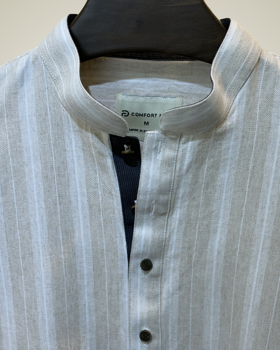 Cream with subtle white pinstripes