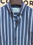Navy blue and white striped shirt